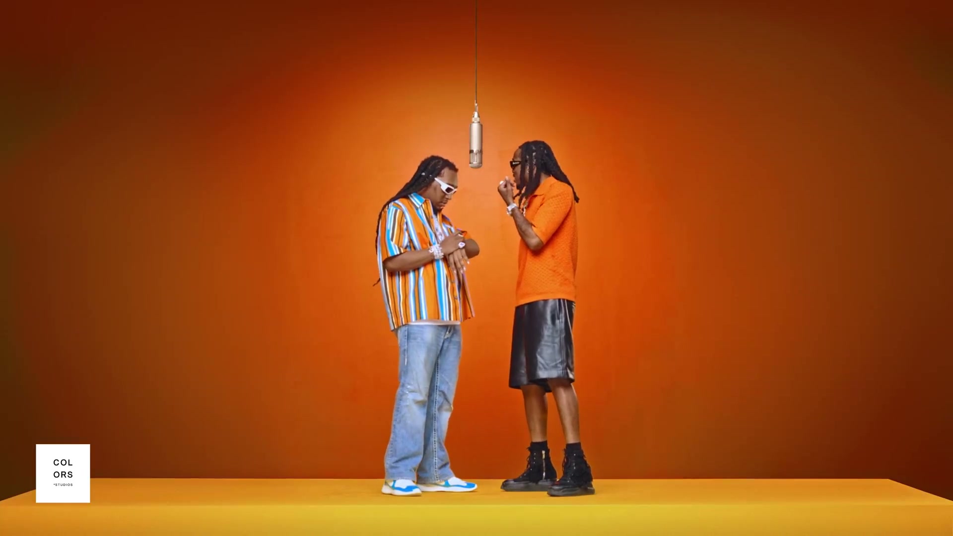 Original performers in the orange studio, three seconds into the selected clip